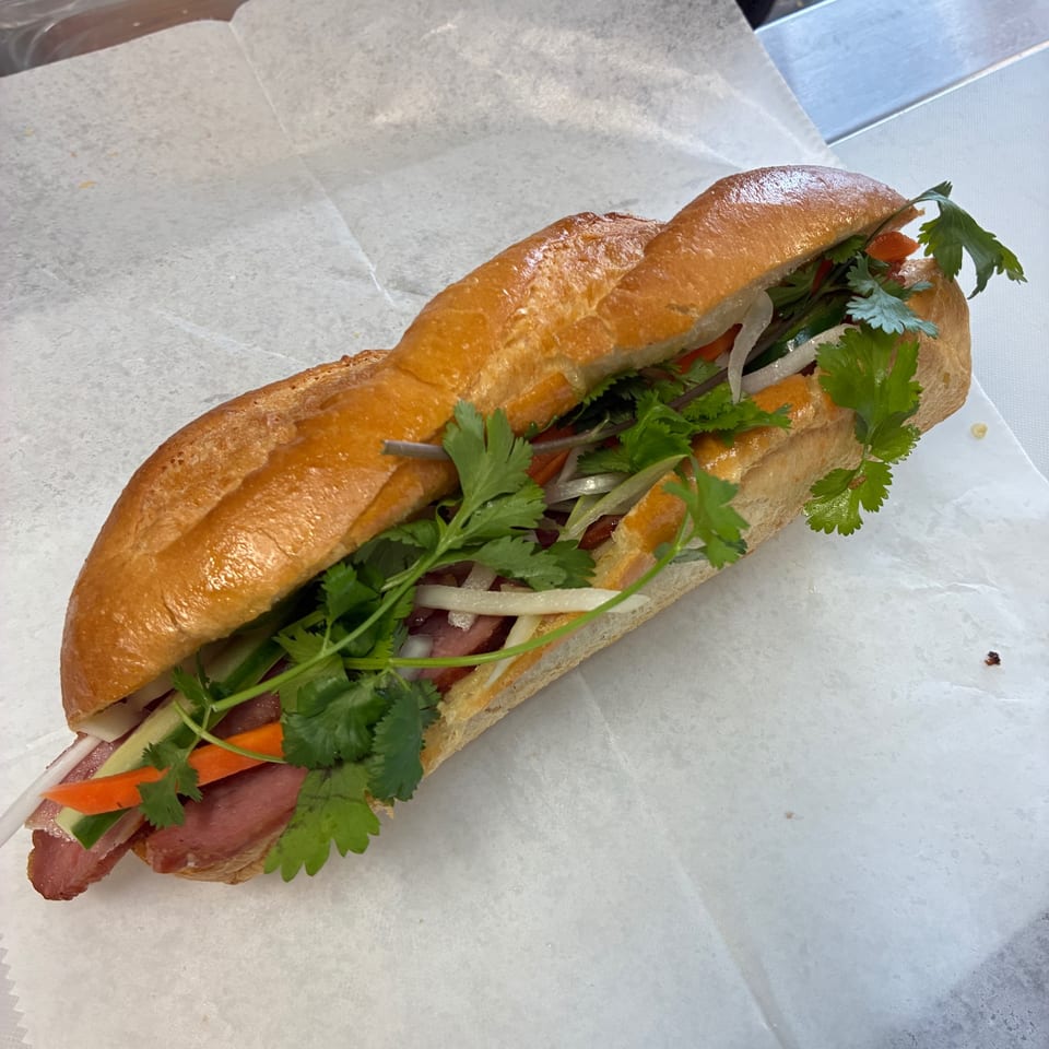 Banh mi with fresh herbs and vegetables